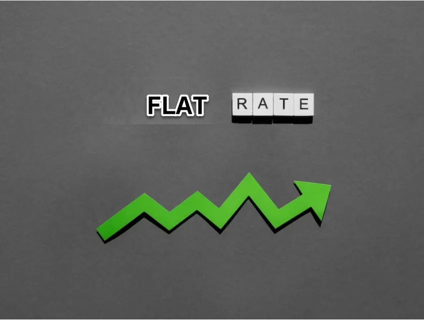 The words Flat Rate spelled in tiles above a green upward arrow on a grey background