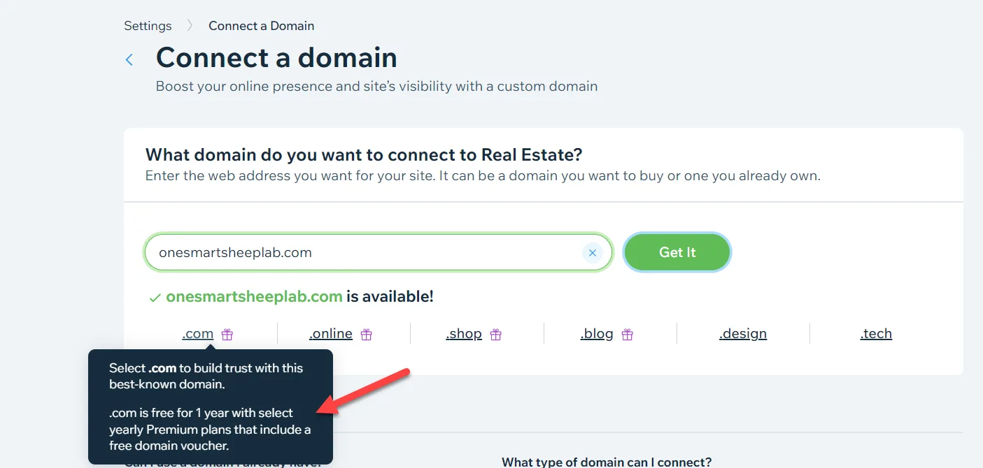 Wix Connect a domain screen showing a domain marked available with extension options and a tooltip about the free .com voucher